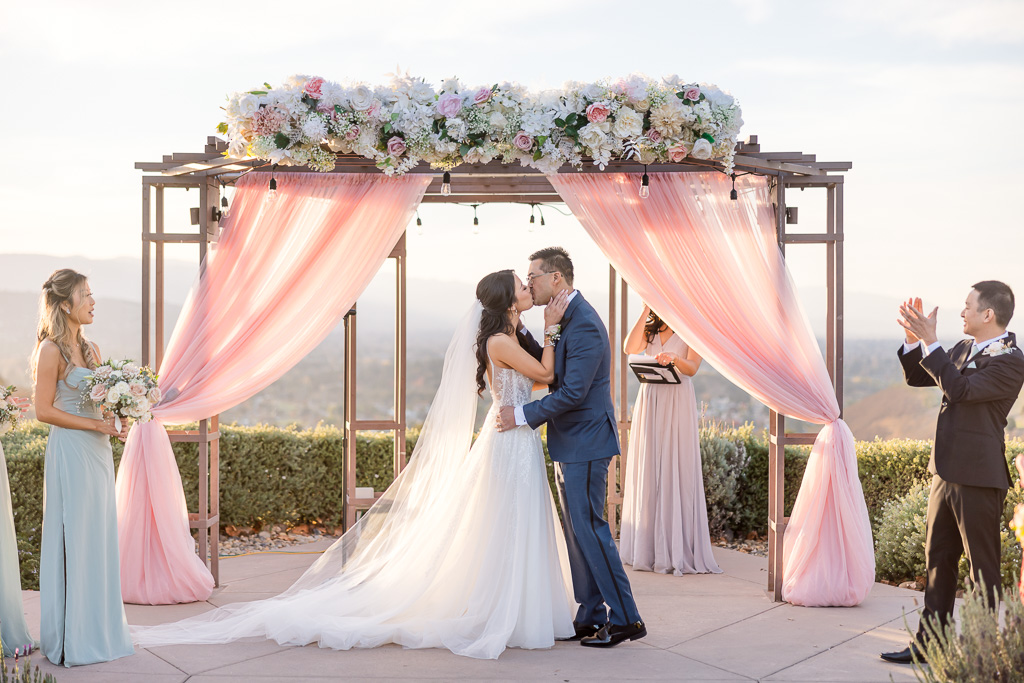 first kiss at Boulder Ridge by Wedgewood Weddings in San Jose