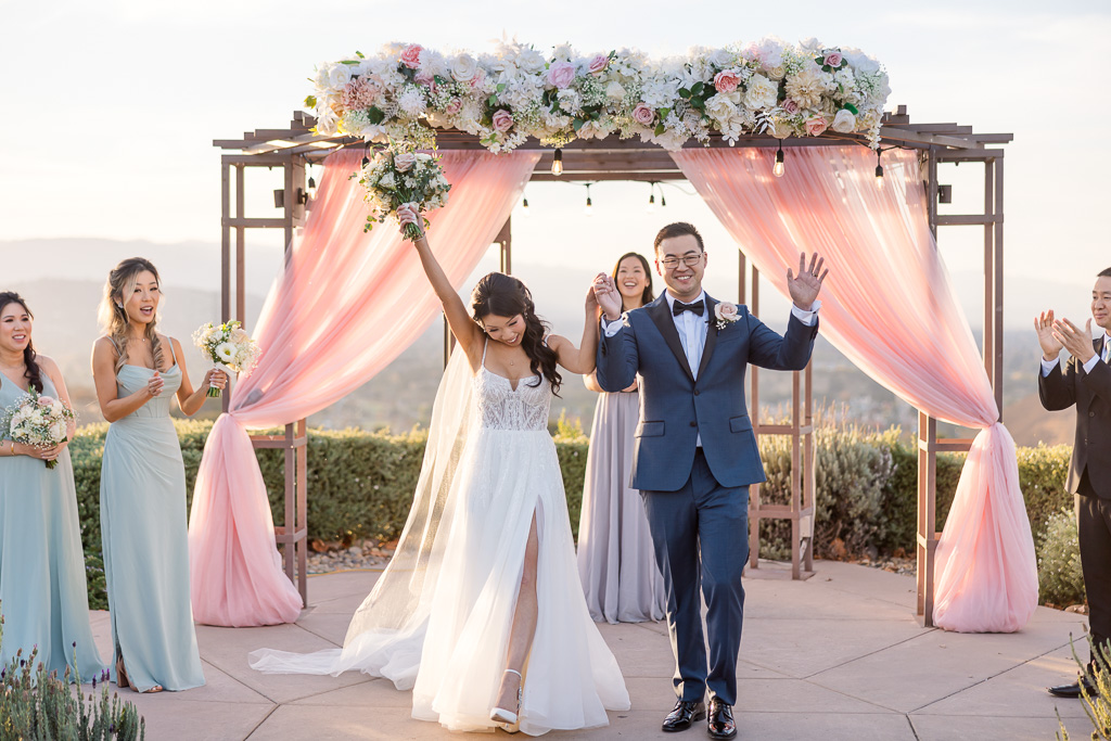 happy moment of wedding recessional at Boulder Ridge San Jose