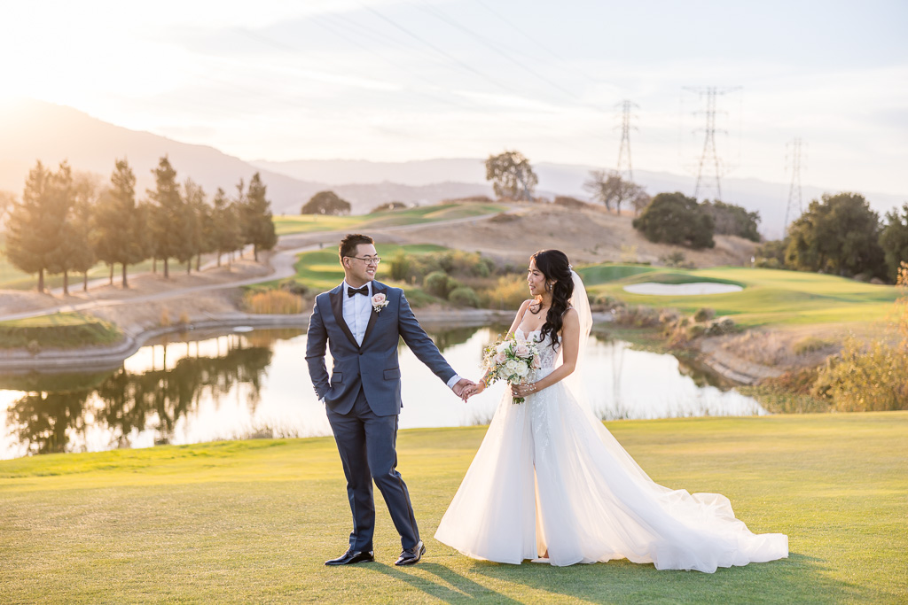 sunset photo of bride and groom at Boulder Ridge in San Jose in front of the pond