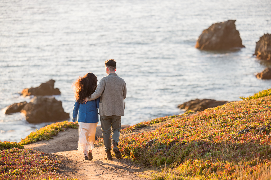 couple walking along the cliffs of Rodeo Beach