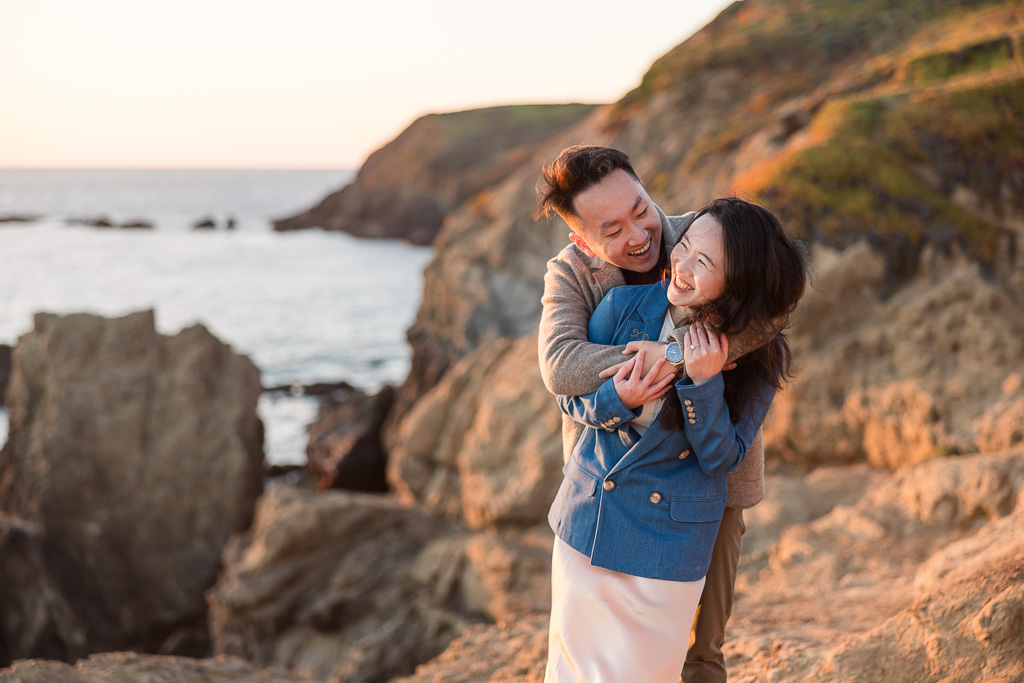 Rodea Beach golden sunset engagement photos