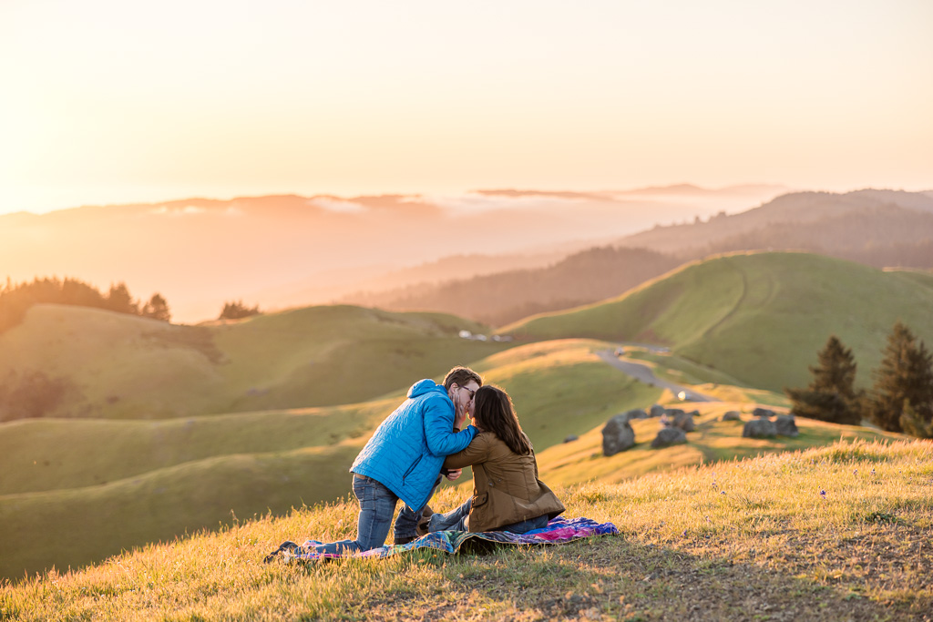 picnic blanket marriage proposal at sunset
