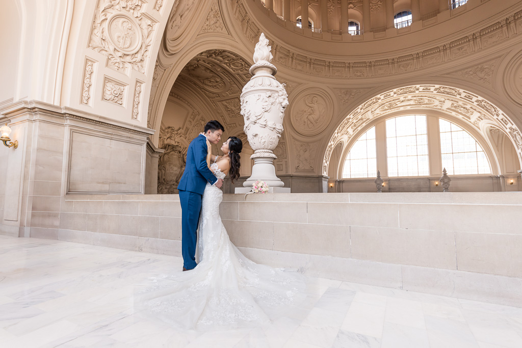 romantic wedding photo at SF City Hall fourth floor balcony