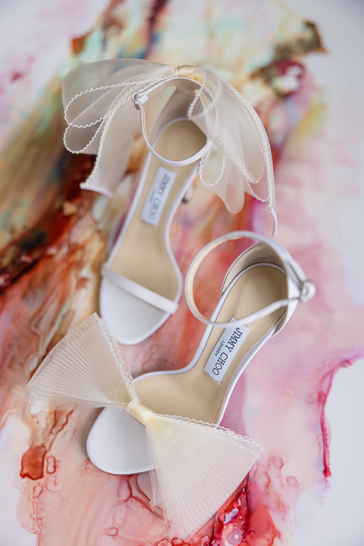 Jimmy Choo wedding shoes on a pink background