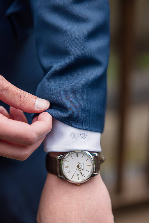 groom's monogrammed shirt sleeve