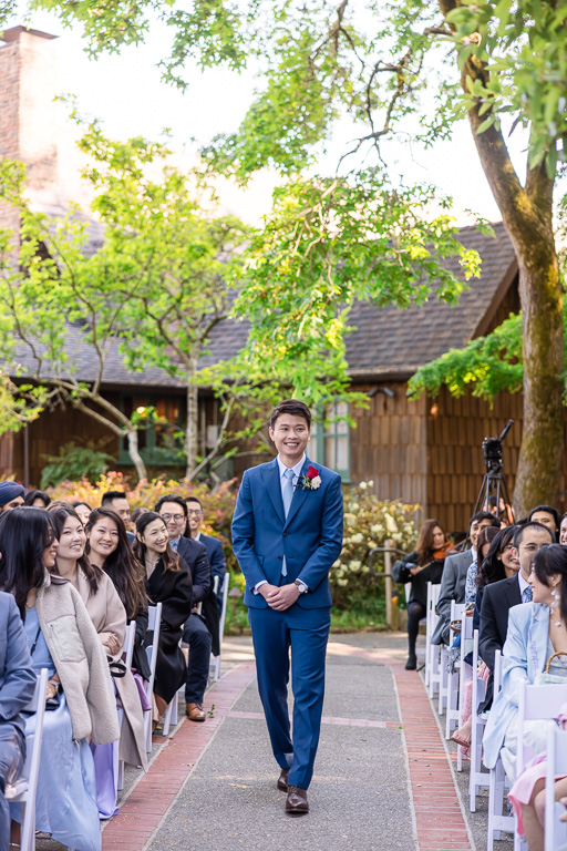 groom walking up the aisle