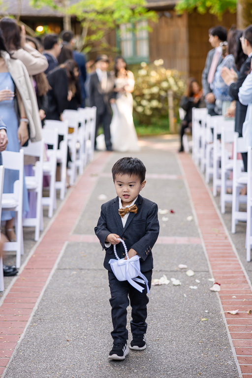 flower boy dropping petals in the aisle