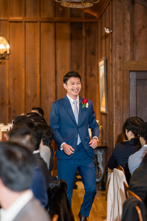 groom entering reception