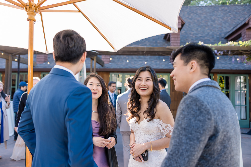 bride and groom greeting guests at cocktail hour