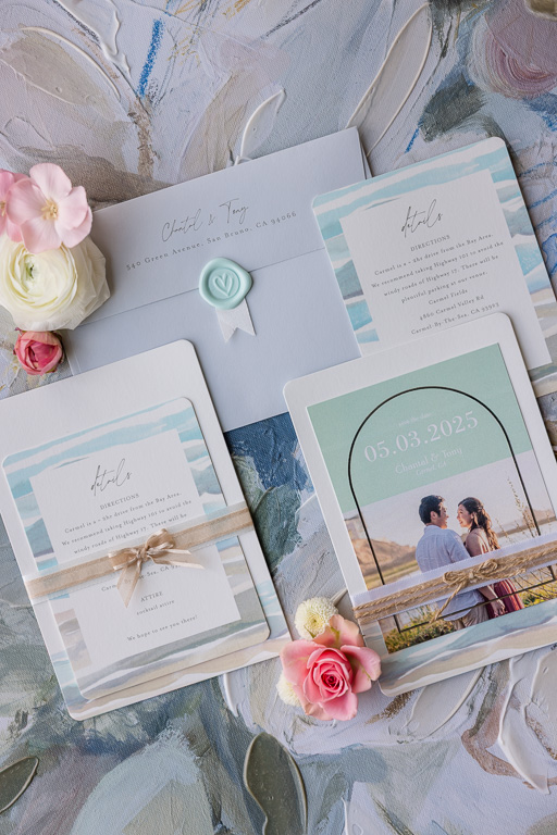 gray muted flat lay wedding items