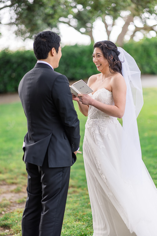 bride reading private vows to groom during first look