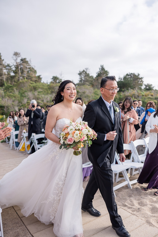 father of the bride handing her off to the groom