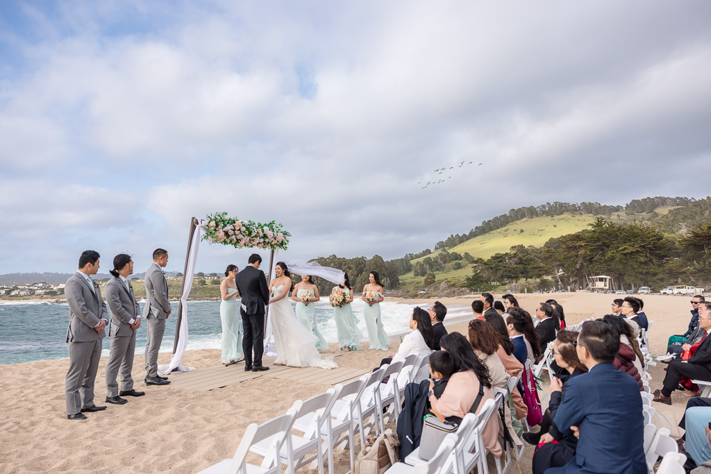 wedding ceremony on the sand at Monastery Beach