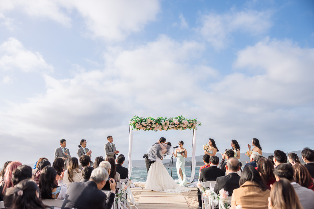 first kiss moment at Monastery Beach in Carmel