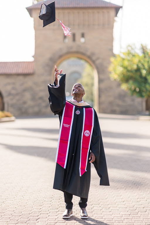 Stanford graduation tossing cap in the main quad