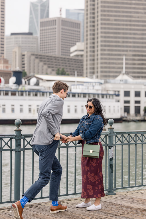 starting to kneel down to propose