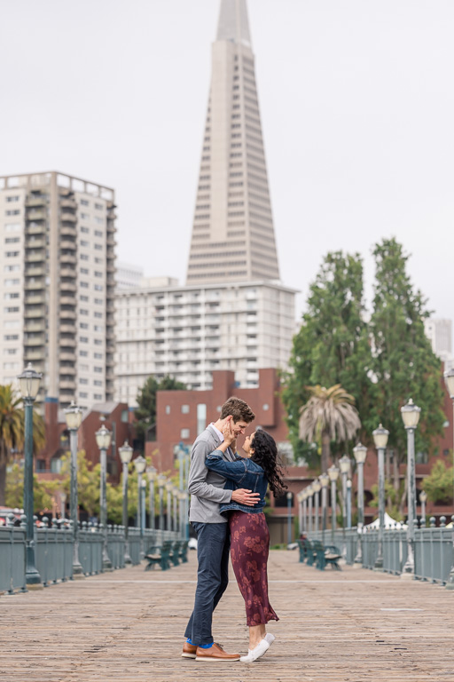 engagement photos with the TransAmerica Pyramid and downtown San Francisco