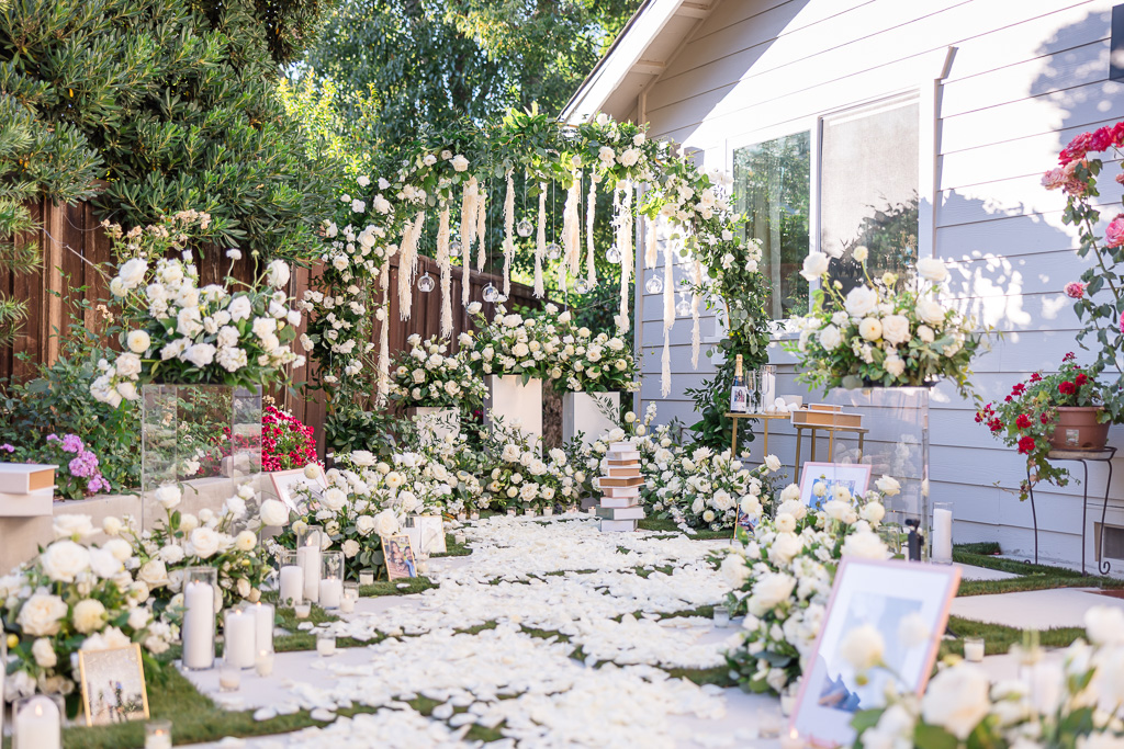 lush extravagant floral setup for a backyard proposal