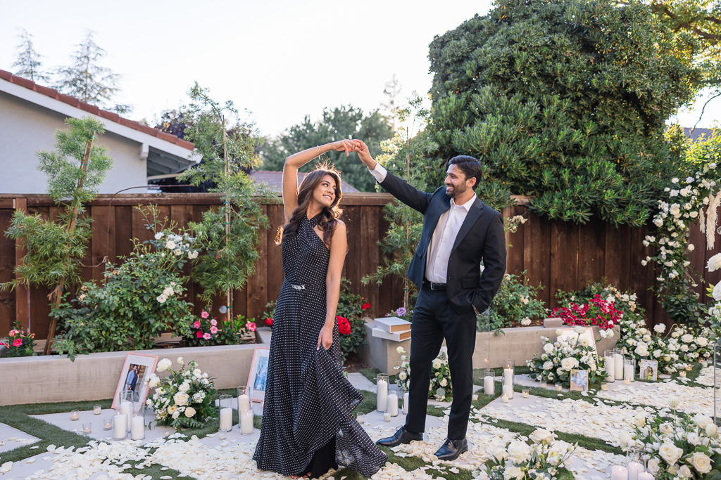 dancing engagement photos in backyard
