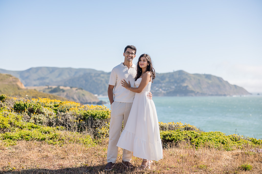 couple wearing all white at Mori Point