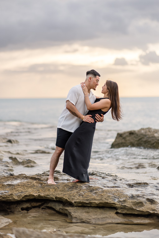 engagement photo with groom-to-be performing a dip on the bride