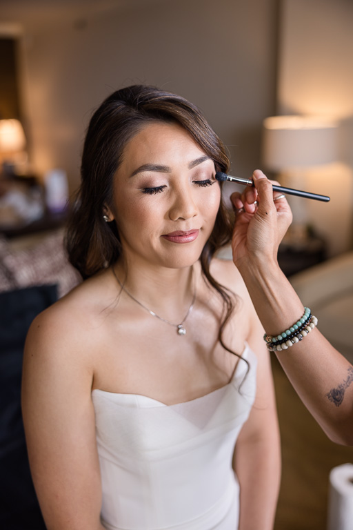 hair & makeup touchups of the bride