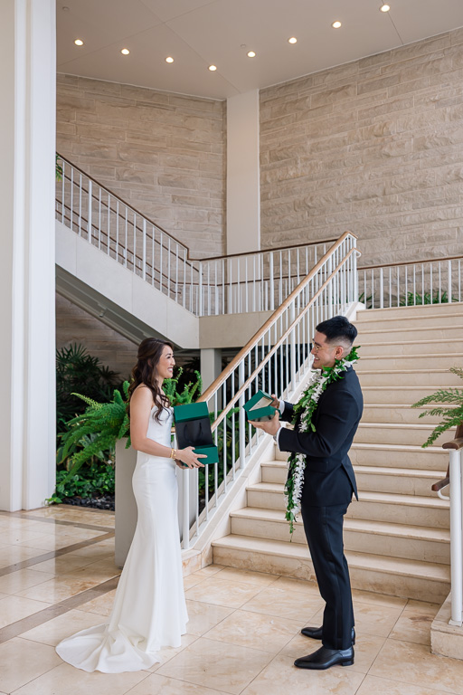 groom appreciating the gift from his bride