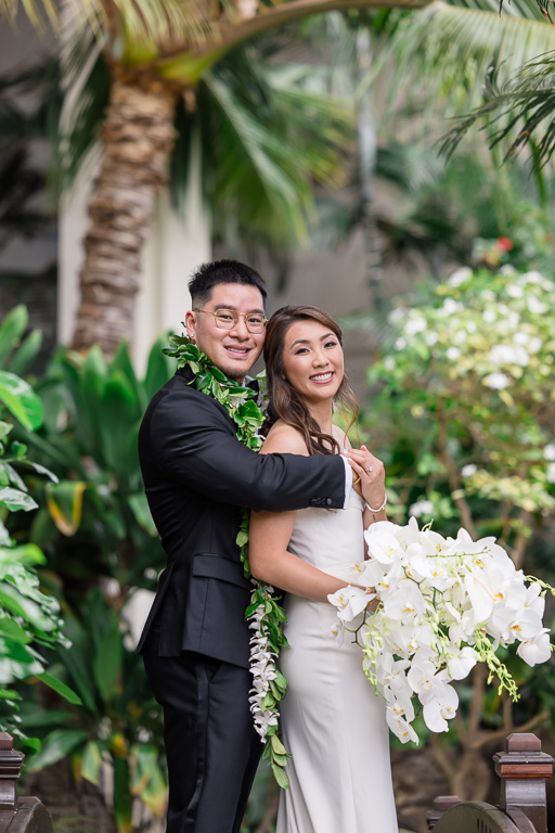 bride and groom wedding portraits at the Four Seasons in Oahu