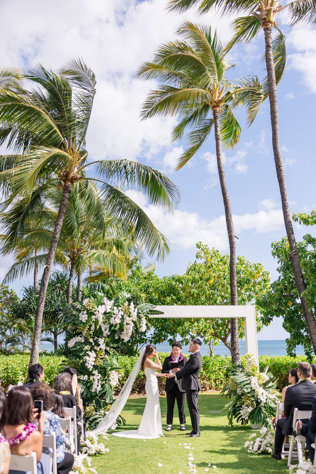 Four Seasons Ko Olina wedding ceremony with big white box altar arch