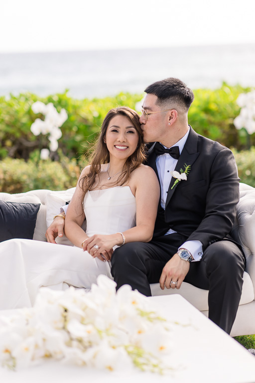 elegant photo of the bride and groom on a couch