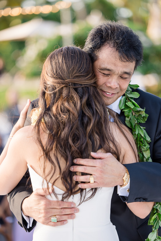 dad with a tear in his eye during the father-daughter dance