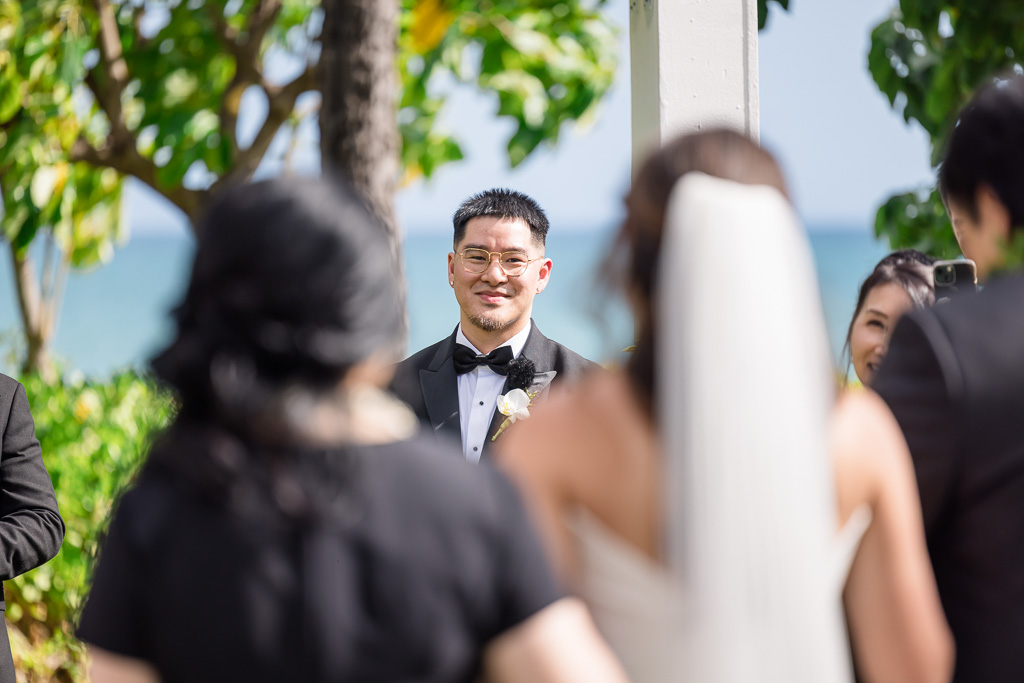 groom ready to receive his bride at the altar