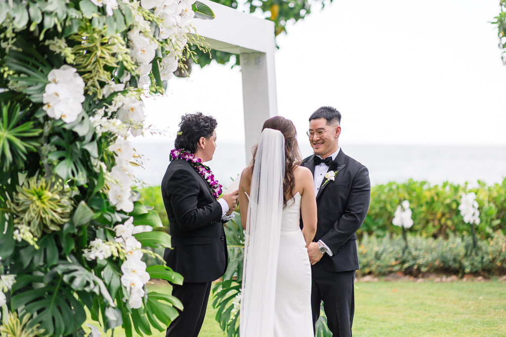 groom smiling at his bride