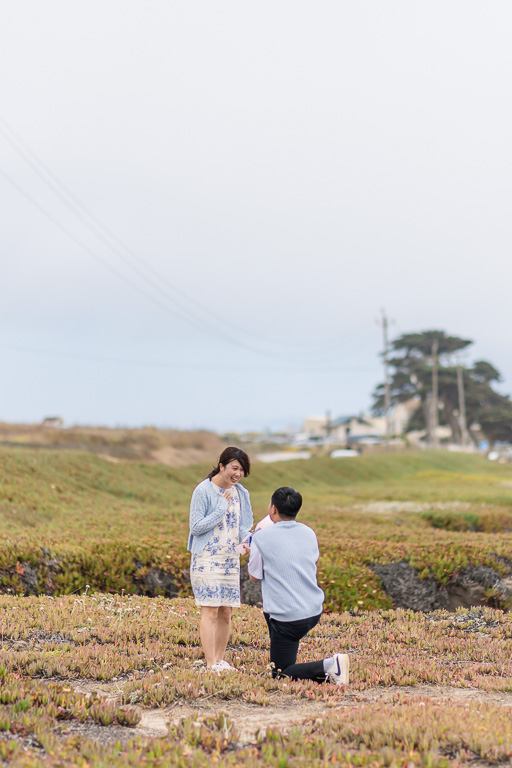 surprise marriage proposal along the coastline