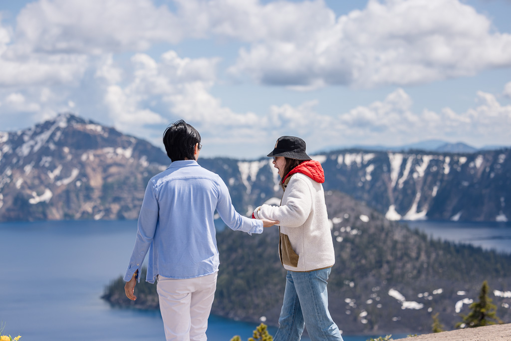 girlfriend starting to realize that this is a surprise marriage proposal