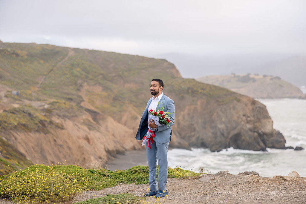 groom waiting with bouquet for bride to arrive for marriage proposal