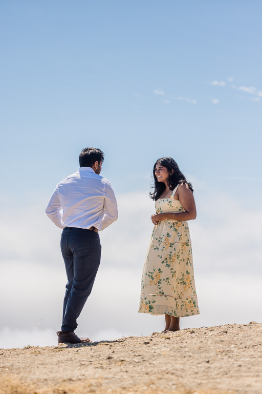 giving proposal speech on top of a mountain