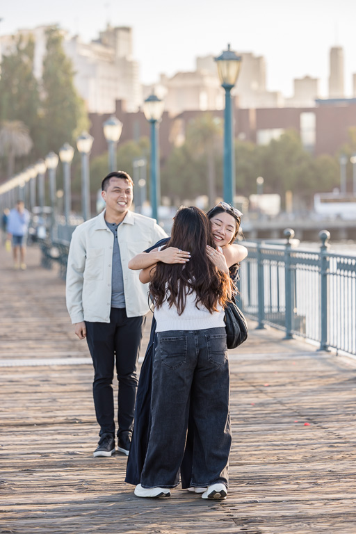 cousin giving her hugs