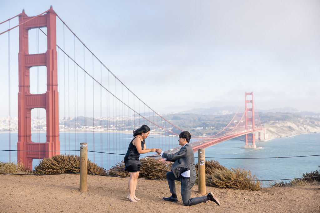 Golden Gate Bridge surprise proposal on a windy day