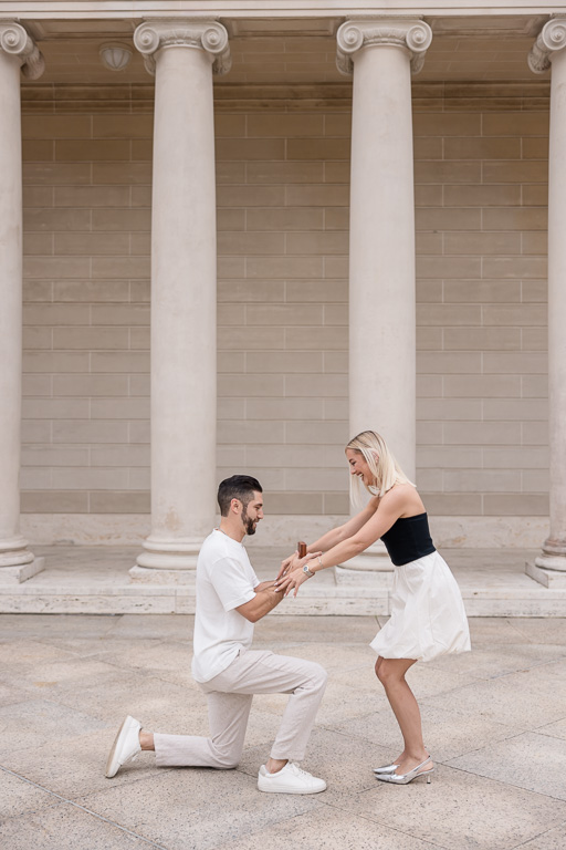 excitedly dancing in reaction to surprise proposal