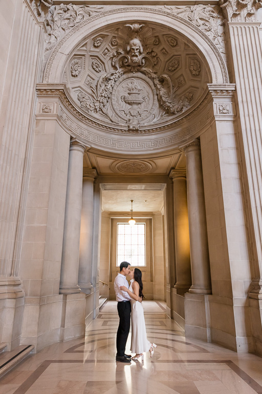 SF City Hall wedding portrait under archway