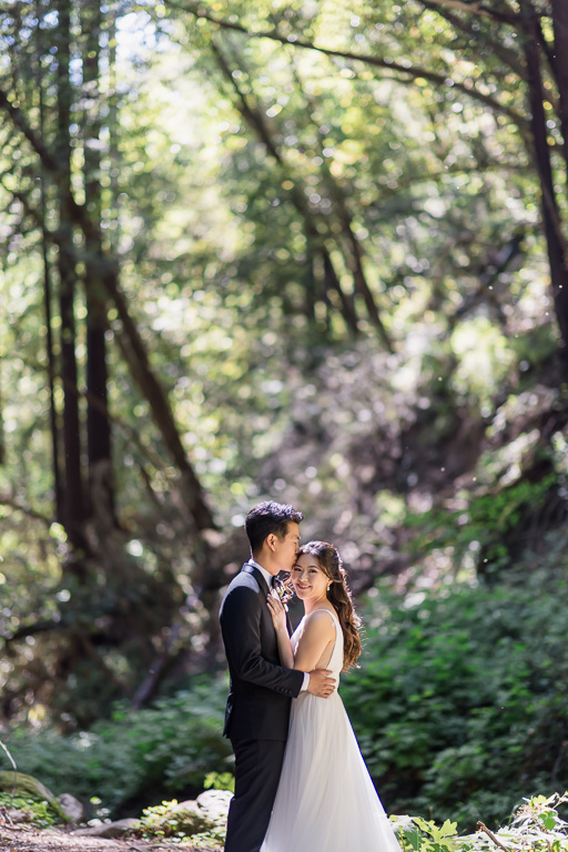 cute portrait of the bride and groom in redwood forest