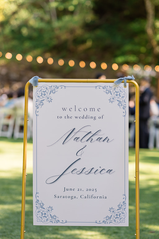 wedding welcome sign mounted on brass frame