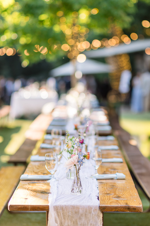 beautiful wooden table with sheer table runner