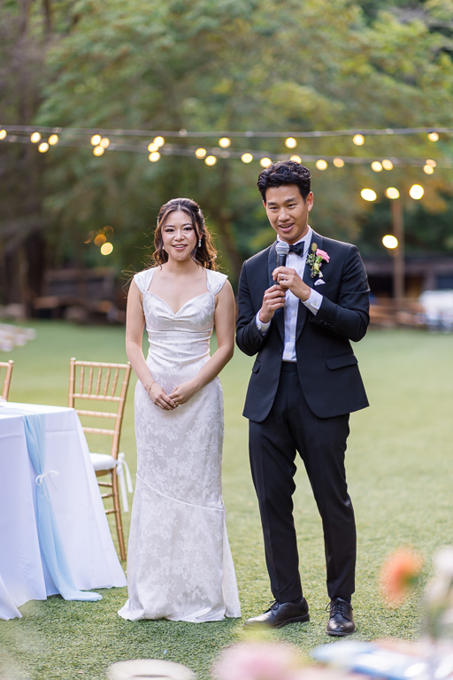 bride and groom giving wedding welcome speech