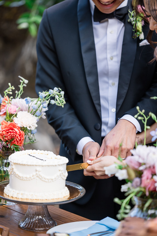 close-up of cake cutting