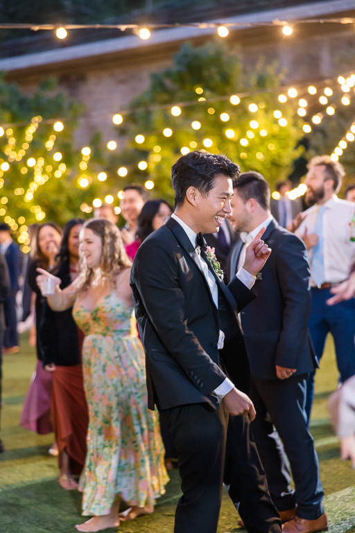 groom on the dance floor