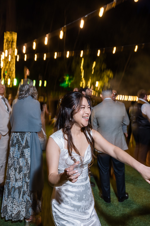 shutter drag photo of the bride dancing