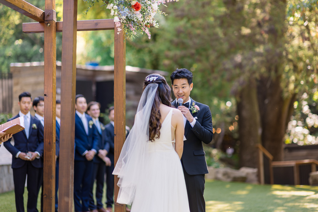groom giving his wedding vows