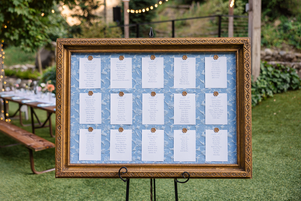 elegant framed table seating chart with wax seals